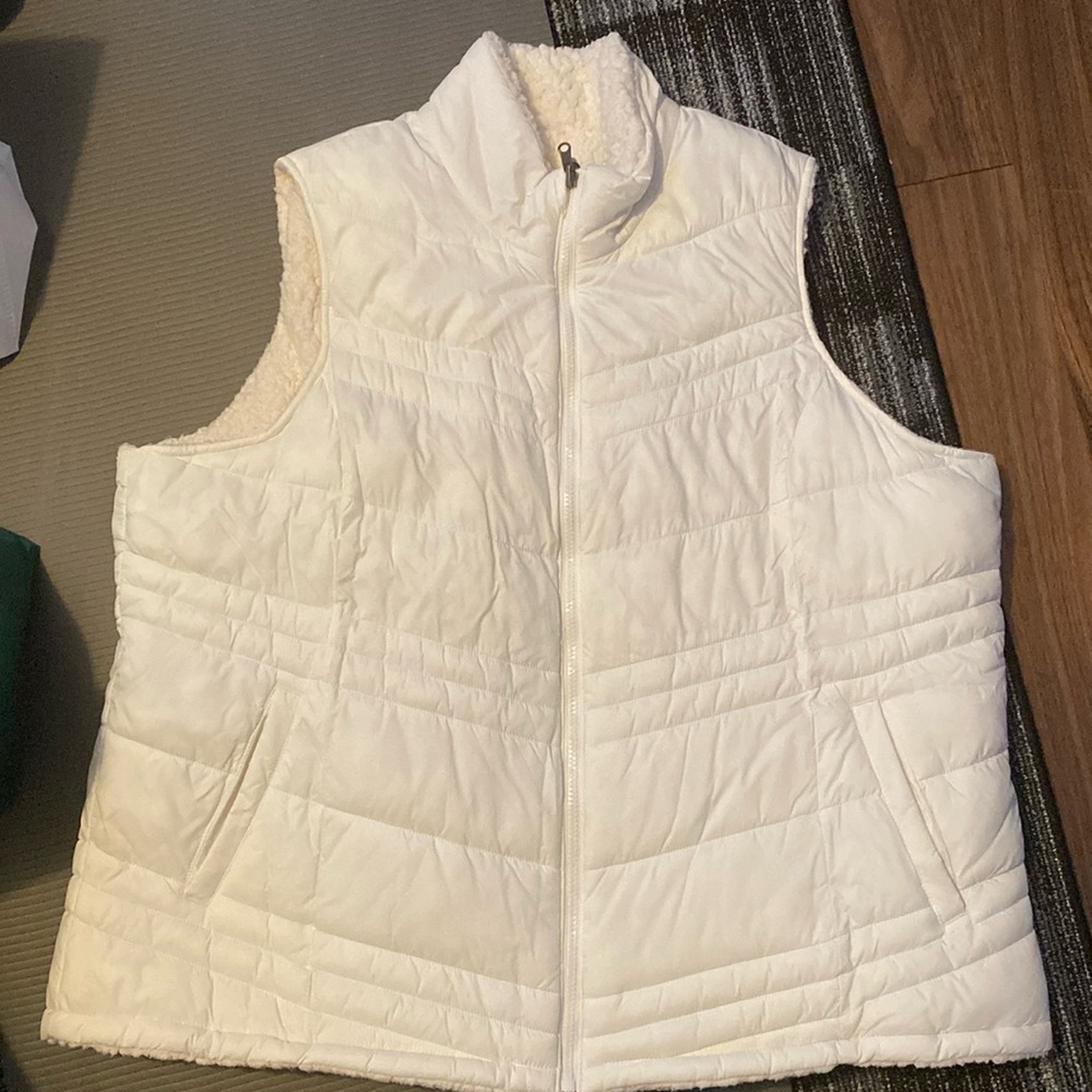 Reversible Sherpa lined puffy vest.